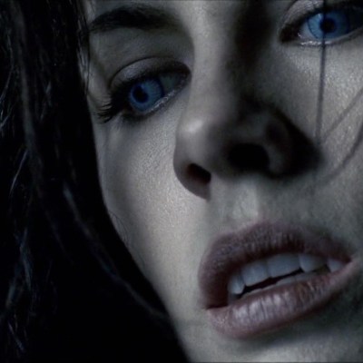 Kate Beckinsale in Underworld with Blue Eyes and Fangs