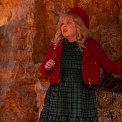 Nicola Coughlan wearing a red jacket and beret in Doctor Who Christmas special "Joy to the World"